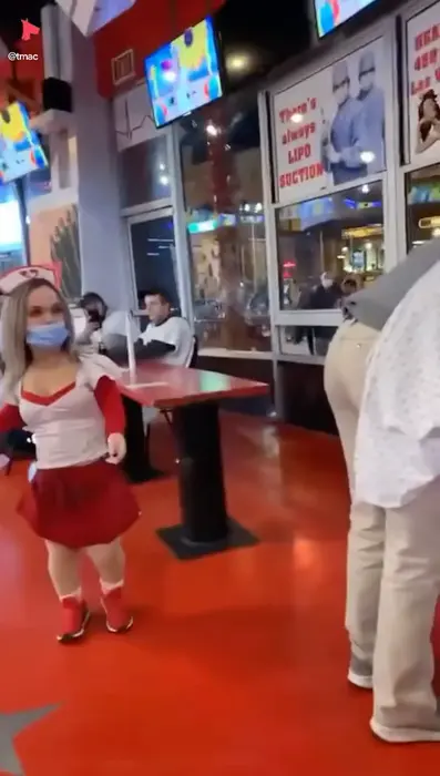 Girl in nurse costume slapping man meme | image tagged in memes | made with Piñata Farms meme generator