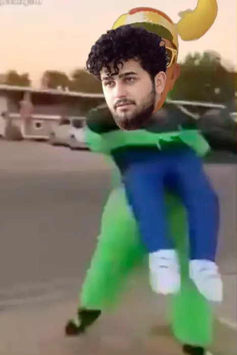 A guy in green alien suit holds a man meme | image tagged in memes | made with Piñata Farms meme generator